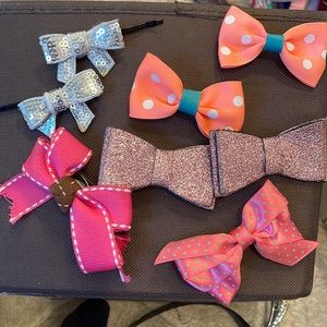 collection of ribbon hair bows pins pieces New Year’s Eve hair